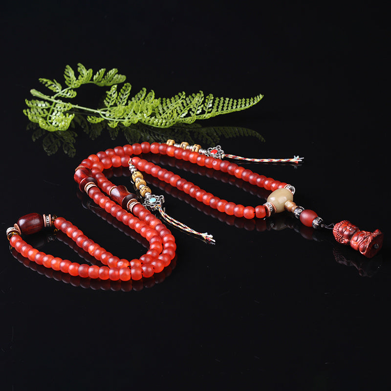 Red horns and prayer beads bracelet