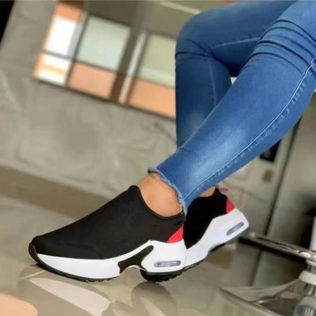 Zapatillas de deporte de punto con punta redonda elástica a la moda para mujer